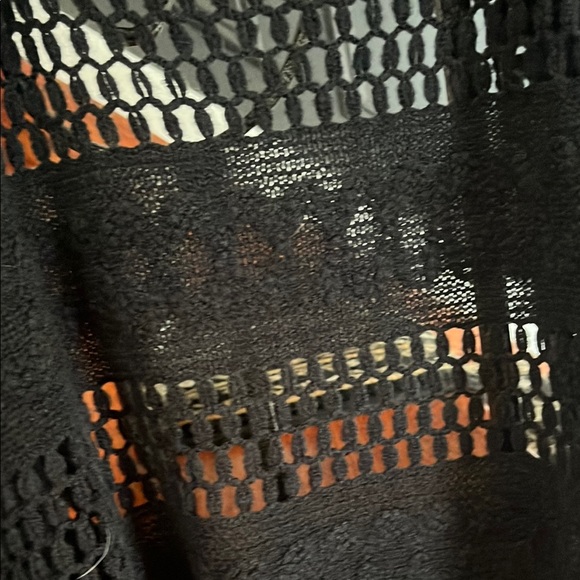 Black Fringe Shark Hem Open Front Knit Vest
Size M/L - Picture 10 of 13